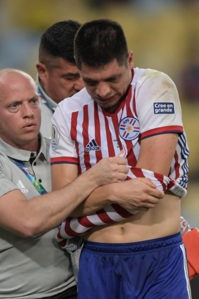 Con traumatismo en el codo