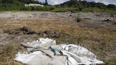 Encuentran una fosa con 119 bolsas con restos humanos en México